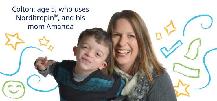 photo of a cheerful mother and son against a background of stars and other markings in crayon