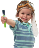Four-year-old boy wearing an old fashioned, leather pilot&rsquo;s hat and goggles, smiling at camera and holding out a FlexPro&reg; pen.
